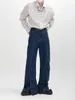 Pantaloni da uomo neri Jeans lavati decostruiti stile avant-garde Cintura in pelle Gamba dritta ampia con spacco largo