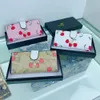 Handla fabriksfabrik grossist Ny kou långmassad plånbok kvinnor handväska högkvalitativ låda matchande kvinnor
