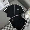 Designer Womens Tracksuits Dreieck Dekoration Mode Casual Sommer Womens Color Kollision Kurzschlug Zip Strickjacken T-Shirt Shorts zweiteilige Set