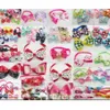 100pcs / lot gros vêtements de mode pour chien chiot chat mignon noeuds papillon cravates bowknot chien produits de toilettage style mixte LY032284