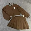 designer CE23 AutumnWinter New Style Fashionable Leather Label Short Baseball Coat+Pleated Skirt Set GZAX