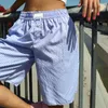 女子ショーツカジュアルな夏のソリッドカラー/格子縞のパタームビーチナイトクラブストリートウェアシックなファッションエラスティックウエスト女性ボーイショート