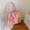 Kvinnor S 2024 Summer Nya trendiga transparenta påse Single Axel Jelly Laser Shooting Handbag Beach 240312