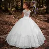 2024 Princesa Champagne encaje Vestidos de niña de flores Gorra vintage Manga Sheer Cuello redondo Apliques Vestido de bola de tul fruncido Chica linda Vestidos de fiesta blancos formales Desfile viste