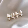 Boucles d'oreilles à clous pour femmes, mode coréenne, émail blanc, cristal d'huile, strass, cadeau de fête pour filles, bijoux Brincos