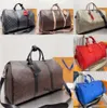 New Hot designer duffle bag Men and women fashion travel bag classic Large capacity handbag Classic printed coated canvas leather boarding handbag 2024