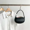 HBP Non-Brand New 2024 Damen Mini-Handtaschen Einfache solide Umhängetasche Kreative Bohnenform Damen Umhängetaschen Mode Frauen Hand