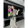 designer P Family 23 SpringSummer New Triangle Decorative Top+Drawstring Skirt Air Layer Fabric Set RZT6