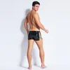 Mutande Moda PVC Pelle Wetlook Lace Up Pantaloncini sexy Panty Uomo Clubwear Ecopelle Fitness Mutandine Fetish Costumi erotici