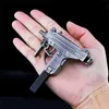 Gun Toys Aluminium 1 3 Miniature Machine Gun Model Uzi 15cm Högkvalitativ Handikraft Keychain Gun For Birthday Presents 240307