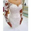 2024 afrikanische Meerjungfrau Hochzeitskleid Sheer Neck Long Sleeves Spitze Applikationen Perlen Brautkleid für die Braut Anpassen Vestidos De Novias Robe De Mairee