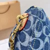 Sacs sous les bras à la mode, sac en toile denim classique avec bandoulière demi-lune, sacs à bandoulière coachly chambray swinger