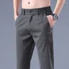 Męskie spodnie wiosna lato elegancka moda harajuku szczupłe spodnie fit luźne wszystkie dopasowanie sportowych solidnych kieszeni prosta noga