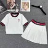 2024 Knitted Women fragrance letter embroidered round neck color-blocking knitted short-sleeved women's top pleated skirt two-piece suit Outfit Elegant Casual Daily