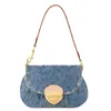 Borsa a tracolla piccola in tela denim blu di design