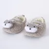 Stivali versione coreana scarpe da bambino stile straniero carino per ragazzi e ragazze accessori invernali in peluche per cartoni animati morbida lana di agnello singola