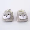 Stivali versione coreana scarpe da bambino stile straniero carino per ragazzi e ragazze accessori invernali in peluche per cartoni animati morbida lana di agnello singola