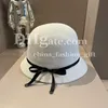 Cappello estivo di paglia Uomo Donna Cappello aderente Nero Bianco Semplice Cappello casual Ombreggiatore solare Cappello da sole per le vacanze