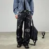 Męskie dżinsy amerykańskie street Hip Hop Graffiti Men Streetwear Loose Casual Gread Noce Denim Spodni plus rozmiar workowate spodnie Kobiety