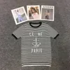 Kvinnors t-shirt designer t-shirt fashionabla kvinnors nya bokstavstryck stift midja genväg kort ärm topp kvinnors topp