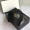Designer Ball Caps Fashion Letter Pattern Hat Ophidia Design för man kvinna Justerbar mössa med metallspänne 2 färger Toppkvalitet214s