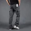 Pantaloni da uomo di grandi dimensioni multitasche tute larghe sport all'aria aperta allenamento militare jogging casual e confortevole 240305