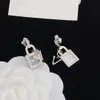 Orecchini pendenti con ciondolo a forma di lettera di trifoglio di cristallo di lusso Designer di marca Moda donna Strass Love Lock Bottiglia Oro argento placcato con diamanti Orecchini a bottone da sposa Gioielli