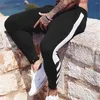 Pantaloni da uomo Pantaloni da palestra in cotone da uomo Pantaloni sportivi a righe Pantaloni da allenamento casual Allenamento con cerniera Fondo Fitness Pantaloni sportivi da corsa maschili