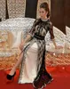 Vestidos de noche caftán de encaje negro de lujo con medias mangas caftán de cristal con cuentas divididas Dubai Arabia vestido de noche largo transparente 4209950