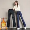 Jeans da donna Autunno Inverno a vita alta più pantaloni caldi in velluto a zampa d'elefante Pantaloni classici in denim elasticizzato skinny addensato casual