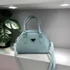 Le sac fourre-tout sac à main de créateur sac à coque femme P R D sac de luxe couleur unie sac en cuir semi-circulaire sac à bandoulière de petite taille de haute qualité sac à bandoulière design