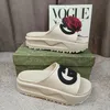 Sandalias de diseñador de lujo zapatillas de verano Mujeres impresas en estampado Tipo de tipo enclavado con forma de tobogán plano