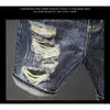 Mens rippade denimshorts fashionabla sommarskort byxor med nödställda rippade designhål koreansk stil kort jeans man 240308