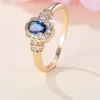 Anéis de cluster Royal Blue Stone Pequeno Oval Casamento Bandas Antique Gold Color Vintage Zircon Empilhamento Festa de Noivado para Mulheres Jóias CZ