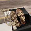 En Kaliteli Roman Gladyatör Düz Sandalet Ayarlanabilir Kablo Ayakkabı Kaydı Bitkisel Boho Flats Ayakkabı Gerçek Deri Sole Lüks Tasarımcılar Slaytlar Fabrika Ayakkabı