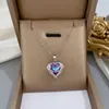 Altra squisita collana con ciondolo a forma di cuore in argento sterling 925 con ali d'angelo per le donne, regalo di San Valentino in cristallo colorato lucido L24313