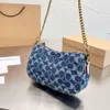 Sacs sous les bras à la mode, sac en toile denim classique avec bandoulière demi-lune, sacs à bandoulière coachly chambray swinger