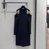 Abiti casual di base Designer ragazza piccante in pelle con bottoni e fiocco sulla spalla Abito a maniche lunghe Catena Abito nero lavorato a maglia in cotone morbido e confortevole alla moda