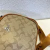 Günstiger Großhandel 50 % Rabatt auf neue Designer-Handtaschen Neue Damen-Umhängetasche Einfache und geprägte Schicht mit runder Mitte aus weichem Leder