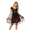Vrouwelijke designer avondjurk, halflange jurk met zwaar borduurwerk, rozenkant en mesh stiksels