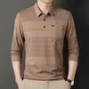 2024 Polo di moda di marca T-shirt grafica a righe solide Manica lunga Autunno e primavera Abbigliamento Polo coreana da uomo 240313
