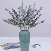 Dekorativa blommor Vackra falska växter 3 grenar Eukalyptusblad Ekovänlig plastskonstgjord för hemmet