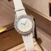 Montre à quartz de luxe pour femmes, de haute qualité, de styliste, à la mode, cadran en diamant, bracelet en cuir, étanche 32mm, offre spéciale