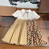 2024 Sommer Mädchen Latticedresses Kinder Bogen Revers Kurzarm Plaid Prinzessin Kleid Designer Kinder Kleidung S1092