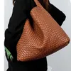 2024 hand woven vegetable basket leisure shopping tot big bag net red belt payment portable single shoulder bag