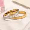 Armreifarmbänder Frauen Gold Europa Amerika Fashion Style Designer Armband Kristall geplattet Edelstahl Hochzeit perfekt