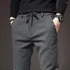 メンズパンツ2024ブランドスリムカジュアルメンズスプリング秋のビジネスワークコットンブラックグレーブルーズボン男性ファッション韓国服
