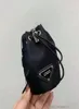 Luxury Children Purse Dedigner Girls triangle nylon bucket bag kids Lineup one shoulder bags women mini wallet A77309677291