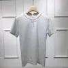 T-shirt da donna Misto lana da donna Marchio di alta qualità di lusso Top 2023 Estate Nuova perla Bowknot Collana di perline O-Collo Nero Bianco T-shirt a maniche corte Abbigliamento casual