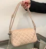 22SS Hand Flap Cosmetic Bag Classic Top Caviar Grain Cowhide Cuero Bolsa de maquillaje Acolchado Tela escocesa Cadena Gold Hardware Bolsas Diseñador de lujo